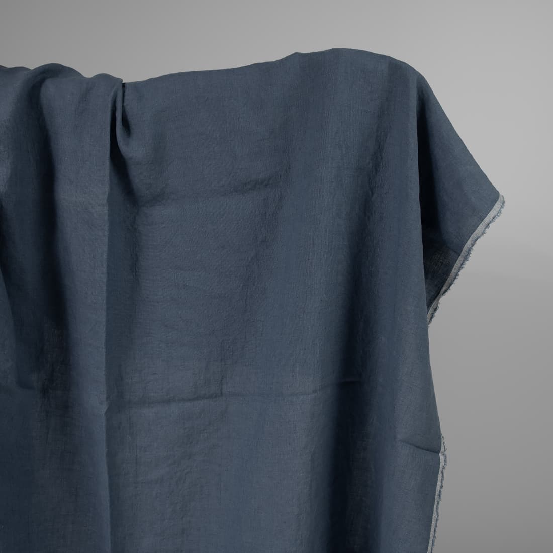 Linstoff i denimblå vasket