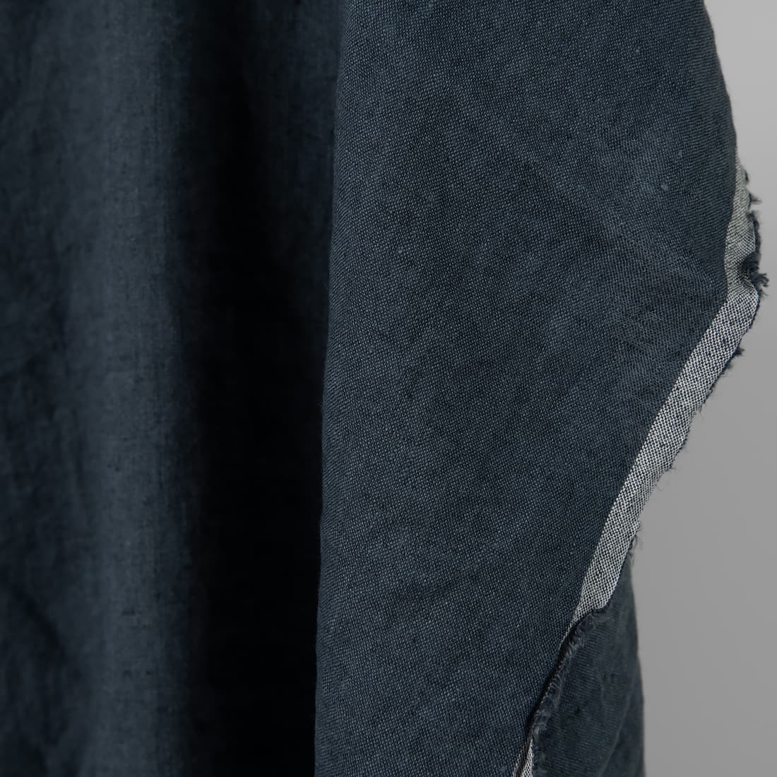 Linstoff denimblå-mørkeblå melert vasket egnet for sying klær og hjemmetekstiler