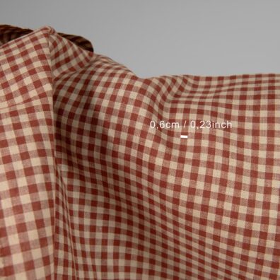 Linstoff brunlig-rødt rutete 180cm bredt