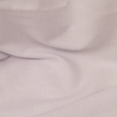 Lin-bomull stoff vevd av hvitt og lys lilla garn, melange