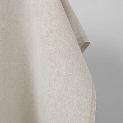 Halvlin stoff beige bredt vevd av hvitt og naturfarget (ufarget, brungrått) garn, melange