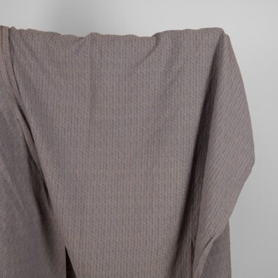 Lin-bomullsstoff grå-brunt mønstret vasket