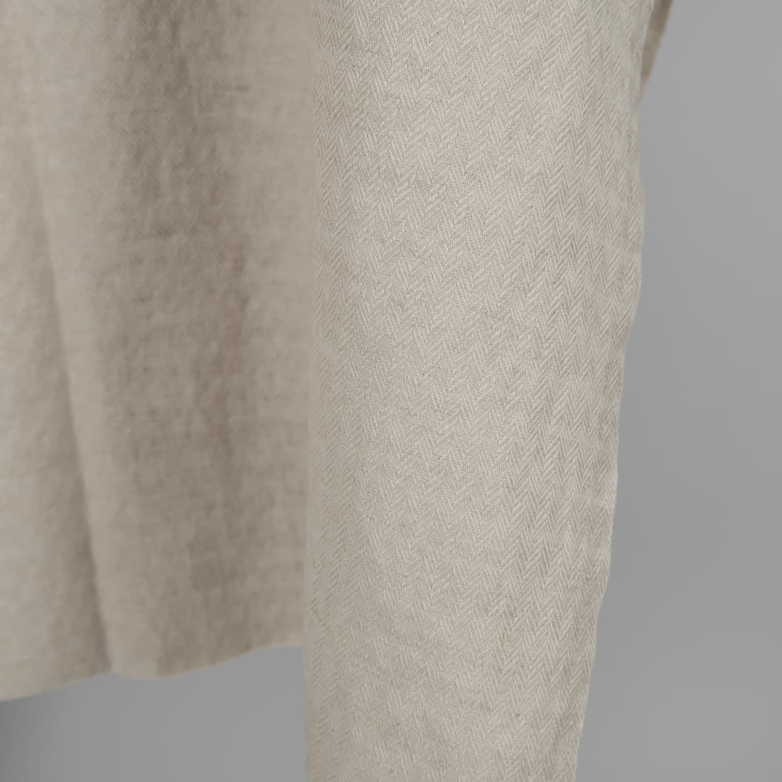 Lin-bomullsstoff beige i fiskebeinsmønster vasket 150cm bredt