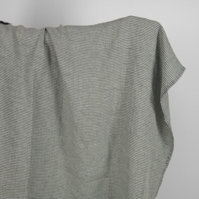 Grønngrått mønstret linstoff vasket