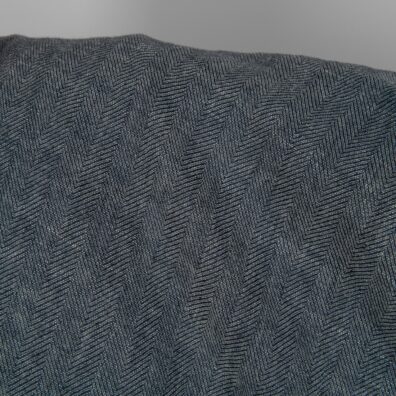 Lin-ull stoff svart-hvitti i fiskebeinsmønster vasket passer til å sy klær og hjemmetekstiler