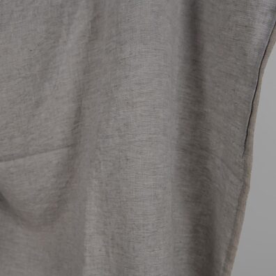 Linstoff vevd av blågrått, brungrått og antrasitt (gråbrunt) garn, vasket