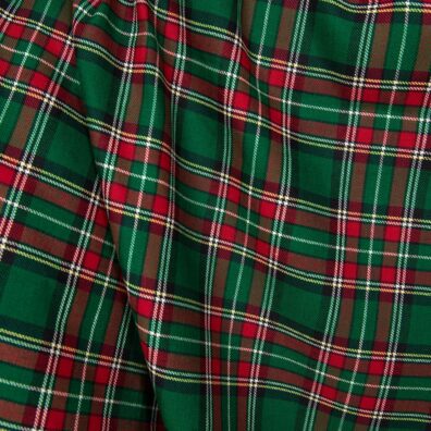 Lin-bomullstoff vevd av smaragdgrønn, intens rød, svart, gul og melkehvit (gulaktig hvit) garn