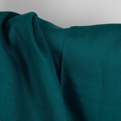 Linstoff i mørk turkis til klær, hjemmetekstiler