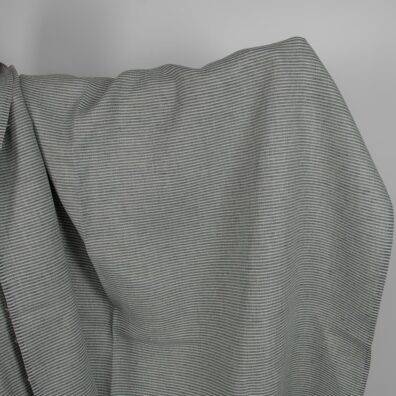 Grønngrått mønstret linstoff