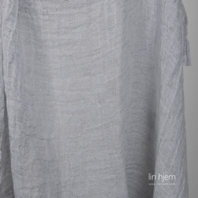 Linstoff grått gjennomsiktig med romber vasket