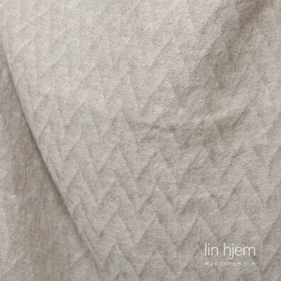 Beige lin-ull stoff i sikksakkmønster vasket, mykt