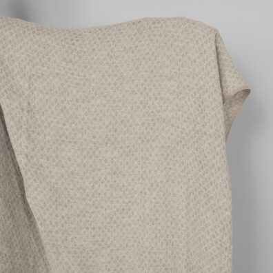 Halvlin stoff brunaktig grå med diamanter vasket