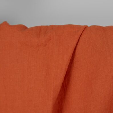 Linstoff mørk oransje vasket, mykt, skånsomt