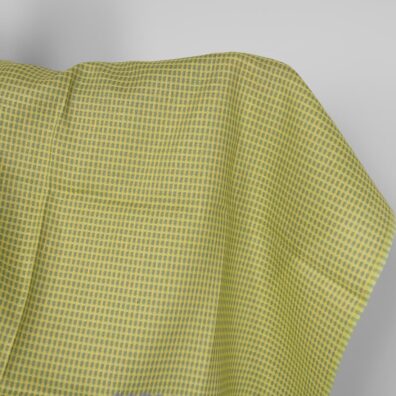 Linstoff med gulgrønt mønster