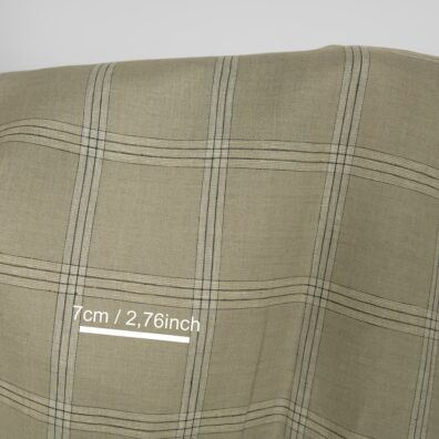 Rutete linstoff, vevd gulbrunt, antrasittgrått, vanilje og mellomgrått garn