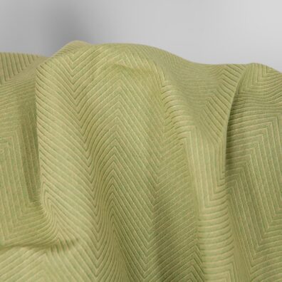 Halvlin stoff i gulgrønn "fiskebein" for sying klær, hjemmetekstiler