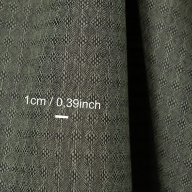 Linstoff med fint grønn-grått diamantmønster