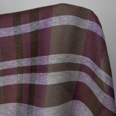 Lett linstoff med lilla, brune striper