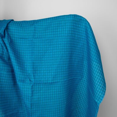 Linstoff i gjennomsiktige blå, turkise ruter