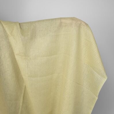 Grønnlig-gult linstoff i gjennomsiktige ruter