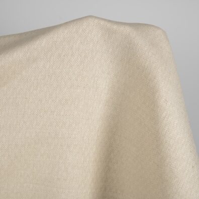 Lin-bomullsstoff beige-hvitt i fiskebeinsmønster