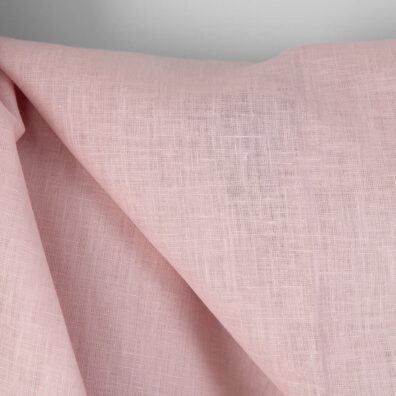 Linstoff i pastellrosa for sying klær, hjemmetekstiler