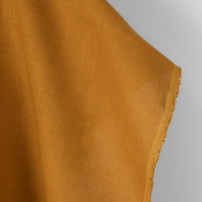 Linstoff mørk sennepsfarget 150cm bredt