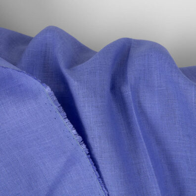 Blått linstoff for sying klær, hjemmetekstiler