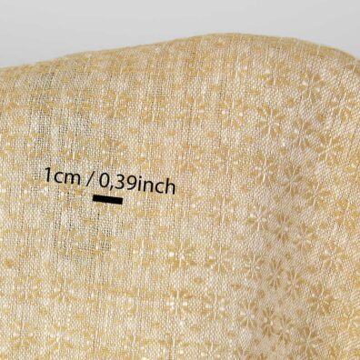 Gult linstoff med blomstermønster for sying klær, hjemmetekstiler