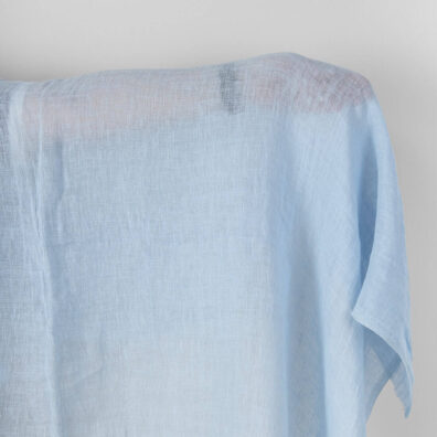 Linstoff blekblått gjennomsiktig vasket