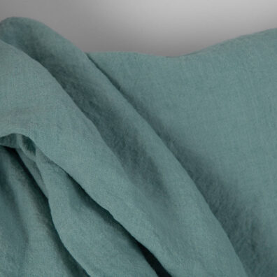 Linstoff akvamaringrønt bredt vasket for sying klær, hjemmetekstiler