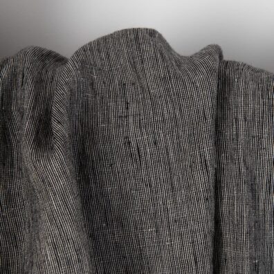 Vasket linstoff naturgrå-svart melert 145cm bredt