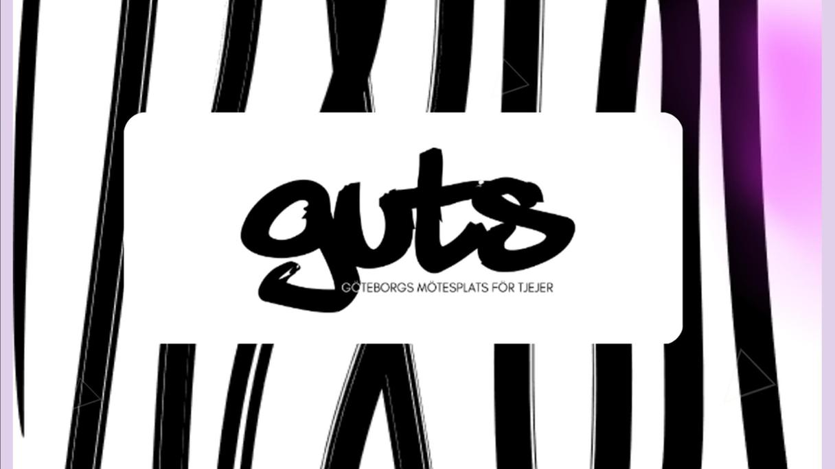 En rosa färgplatta med svarta ränder och Guts logotyp