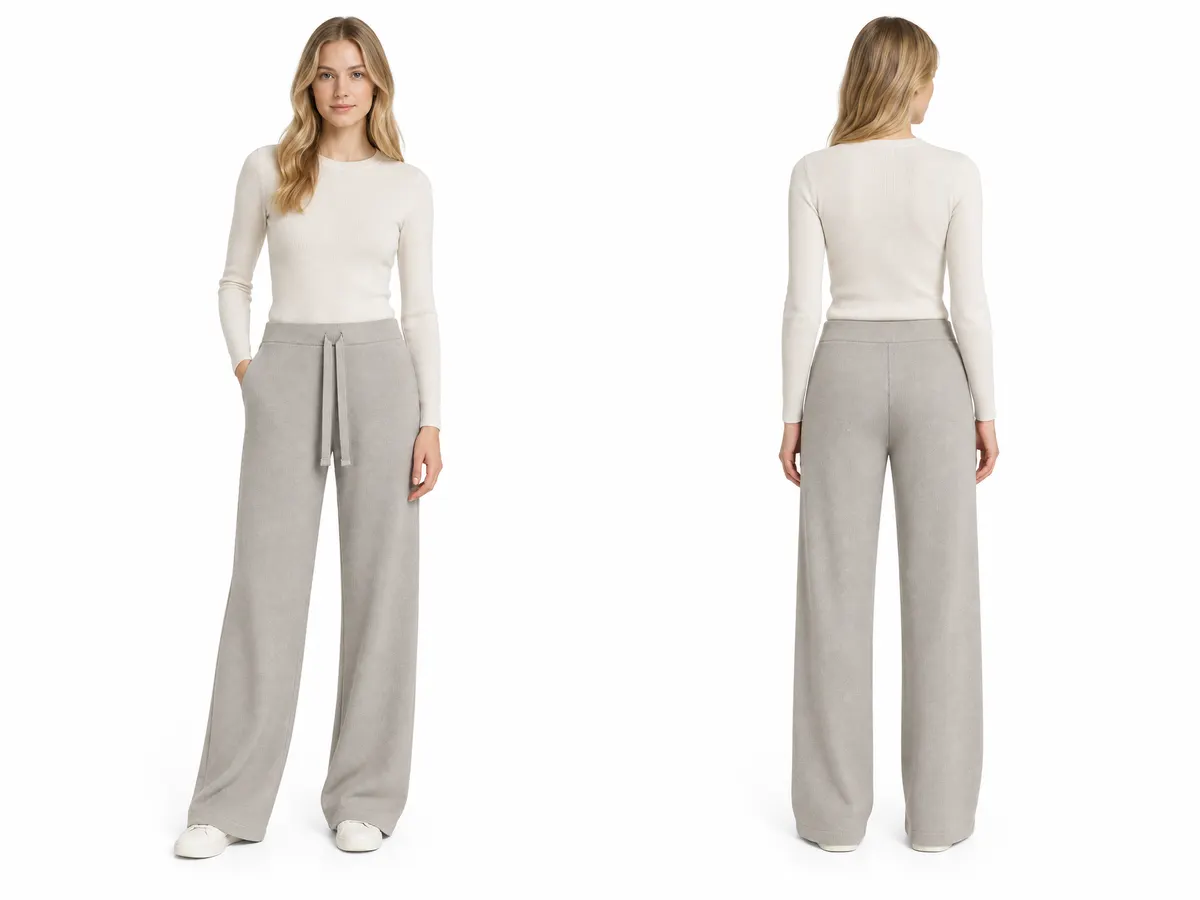 Model wearing the ash pashmina wide-leg knit trousers
