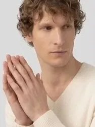 Model wearing the ivory pashmina V-neck sweater