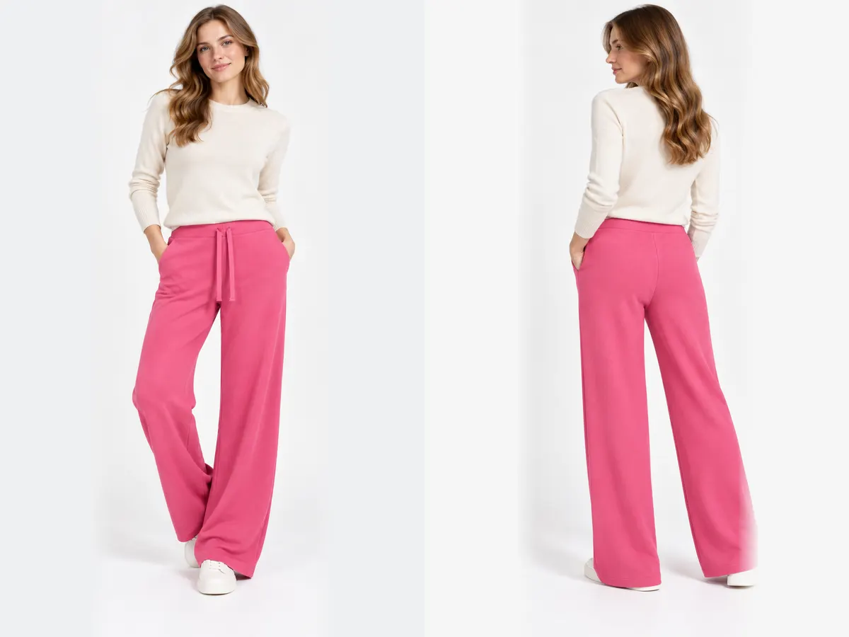 Model wearing the pink pashmina wide-leg knit trousers