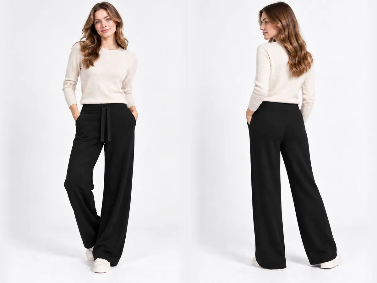 Model wearing the black pashmina wide-leg knit trousers