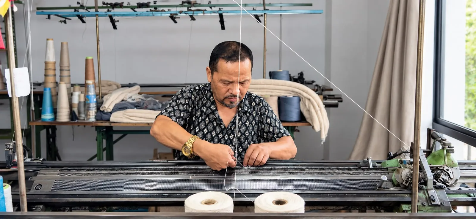 Artisan weaving at the loom in our Kathmandu factory