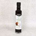 Front view of Rayners Organic Coconut Aminos glass bottle complete with label and black tamperproof seal.