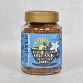 Glass jar of Clipper organic Fairtrade Instant Coffee 100g from front showing label on closed jar.