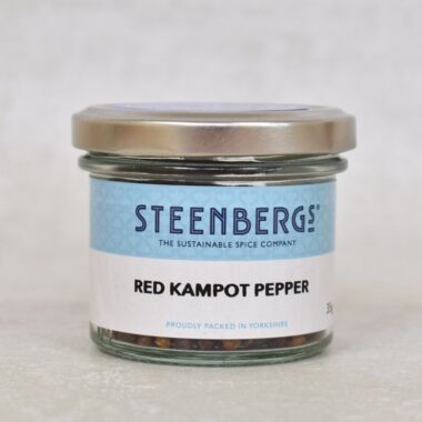 Front photo of Steenbergs Red Kampot Pepper in a jar with silver lid and label.