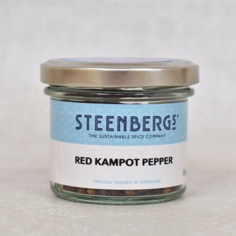 Front photo of Steenbergs Red Kampot Pepper in a jar with silver lid and label.