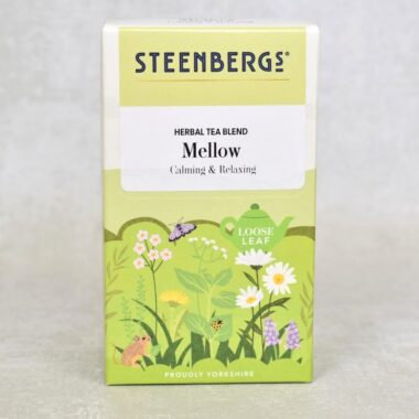 Front view of Steenbergs mellow herbal tea. The box shows British countryside and wildflife.
