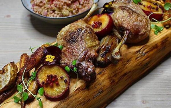 Lebkuchen roast Duck, with pink peppercorn and honey plums, cumin roasted roots, stone fruit and cabbage braised pearl barley recipe
