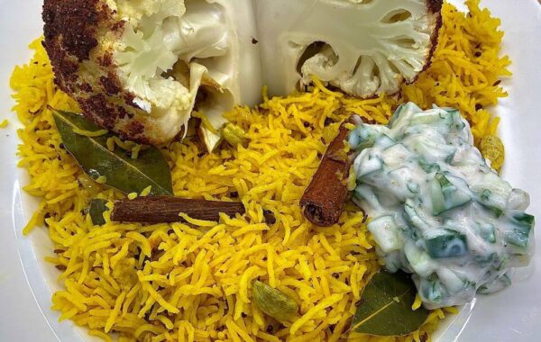 Garam Masala Spiced Whole Roasted Cauliflower with Pilau Rice and Coconut Raita