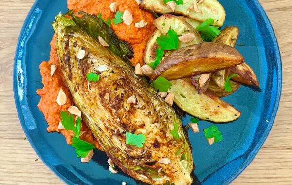 Sweet and smoky cabbage ‘steaks’ with rosemary potato wedges and romesco sauce recipe