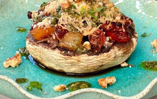 Baked Portobello Mushroom stuffed with roasted vegetables and pesto
