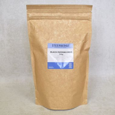 Front image of Steenbergs Black Peppercorns from Brazil in brown heat sealed paper bag with blue and white label.