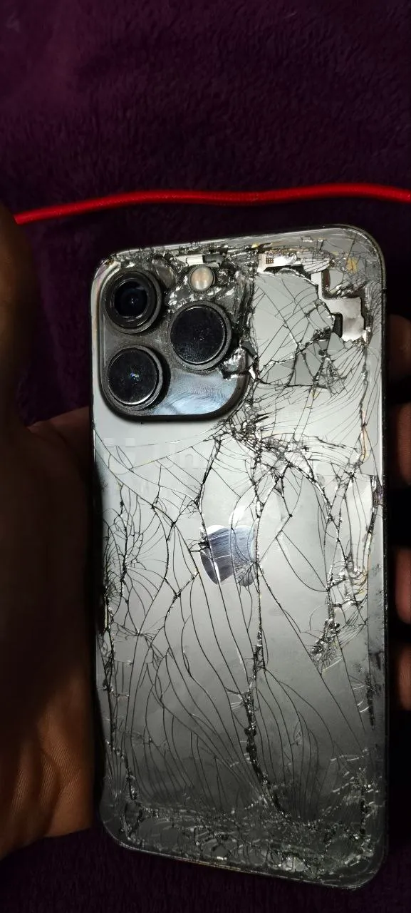 iphone 13 pro smartphone with a broken screen